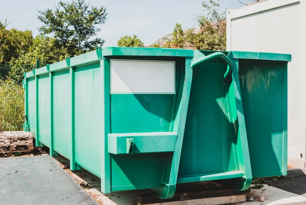 Home renovation debris ready for dumpster removal in New Braunfels, TX