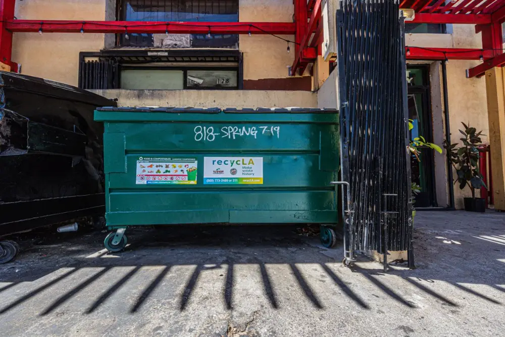 Clean 10 yard dumpster ready for delivery to a New Braunfels driveway